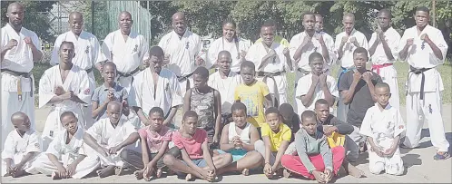  ?? (Pics: Machawe Fakudze) ?? The Oyama Kyokushin Karate artists posing for a group photo after the joint meeting which was held at Zakhele yesterday.