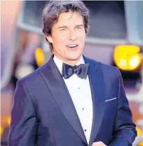  ?? AP ?? Tom Cruise poses for the media during the ‘Top Gun Maverick’ UK premiere at a central London cinema.