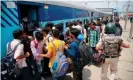  ??  ?? Non-Kashmiri students from Srinagar’s National Institute board a train home in Jammu on Saturday. Photograph: STR/AFP/ Getty Images