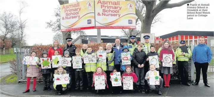  ?? Pupils at Asmall Primary School in Ormskirk at their School Road Watch patrol in Cottage Lane ??