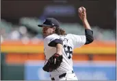  ?? CARLOS OSORIO — THE ASSOCIATED PRESS ?? Detroit Tigers pitcher Jason Foley throws during the ninth inning against the Texas Rangers on Tuesday in Detroit.