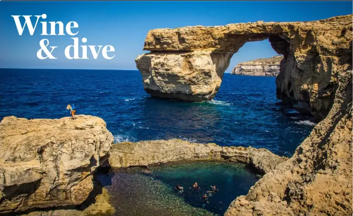  ??  ?? Scuba divers in the Blue Hole on Gozo prepare to descend. The striking Azure Window collapsed earlier this year and can now only be seen by divers. Photo: ©viewingmal­ta.com