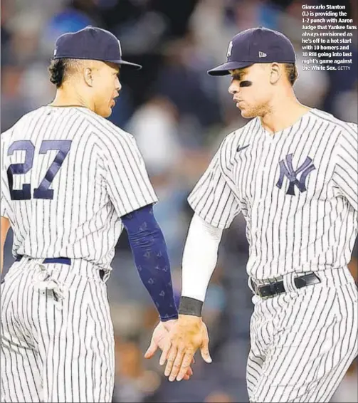  ?? GETTY ?? Giancarlo Stanton (l.) is providing the 1-2 punch with Aaron Judge that Yankee fans always envisioned as he’s off to a hot start with 10 homers and 30 RBI going into last night’s game against the White Sox.