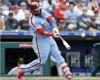  ?? MATT SLOCUM — THE ASSOCIATED PRESS ?? First baseman Carlos Santana launches a three-run homer off San Franciso Blach in the fourth inning to put the Phillies in front for good Thursday. starter Ty