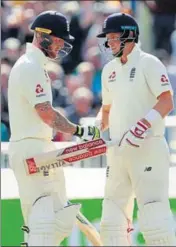  ?? REUTERS ?? England captain Joe Root (right) and allrounder Ben Stokes hit fifties to lead England’s fightback in Old Trafford.