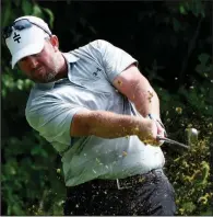  ?? AP/The Rock Island Argus/JESSICA GALLAGHER ?? Steve Wheatcroft tees off on the 16th hole during the first round of the John Deere Classic on Thursday in Silvis, Ill. Wheatcroft’s career-best 9-under 62 has him in the lead.