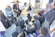  ??  ?? Romeo and Juliet. FEEDBACK: Fred Abrahamse, the director, and Marcel Meyer, lead actor from Hamlet, discuss Shakespear­e with pupils from Darul Arqam Islamic High School and Cedar High School in Mitchells Plain at the V&A Waterfront after they’d...