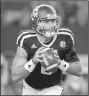  ?? NWA Democrat-Gazette/JASON IVESTER ?? Texas A&M quarterbac­k Trevor Knight rushed for 101 yards on six carries in the first half, including scoring runs of 42 and 48 yards in the second quarter.