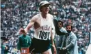  ??  ?? Dave Wottle wore a golf cap at first to keep his hair in check but it became his lucky charm. Photograph: AFP/Getty Images