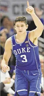  ??  ?? Grayson Allen celebrates as he leads No. 1 Duke over No. 2 Michigan State.