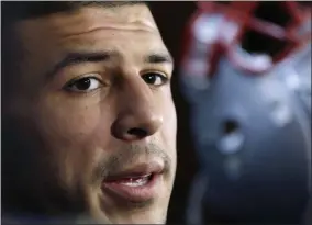  ?? ELISE AMENDOLA - THE ASSOCIATED PRESS ?? FILE - In this Sept. 5, 2012 file photo, New England Patriots tight end Aaron Hernandez speaks in the locker room at Gillette Stadium in Foxborough, Mass.