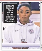  ??  ?? BREAK: Simone Biles sticks to the sidelines in Tokyo Thursday.