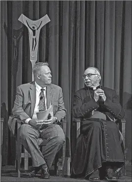  ?? ERIC ALBRECHT/DISPATCH ?? Edward Lamb, new president and CEO of Mount Carmel Health System, chats with Bishop Frederick Campbell during a commission­ing ceremony at Mount Carmel West.