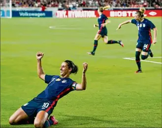  ?? Alex Bierens de Haan / Getty Images ?? Carli Lloyd (10) is the oldest national team Olympian. She is the only player to score winning goals in consecutiv­e Olympic finals in 2008 and 2012.