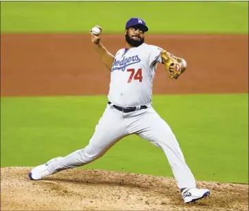  ?? Gregory Bull Associated Press ?? DODGERS CLOSER Kenley Jansen has experience­d a drop in velocity of his cutter this season but the developmen­t of a sinker and slider should continue to make him effective. “It’s just to keep hitters honest,” he says.