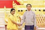  ??  ?? Myanmar’s President Win Myint, right, shakes with visiting Indian External Affairs Minister Sushma Swaraj during their meeting at the President House in Naypyitaw on Thursday