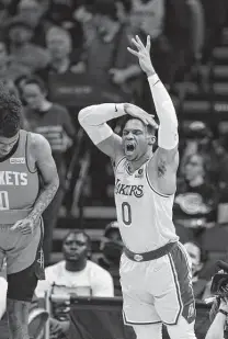  ?? Mark Mulligan / Staff photograph­er ?? Russell Westbrook disagrees with a call Tuesday as the Lakers broke a five-game losing streak that led to increased criticism.