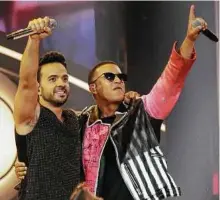  ?? Associated Press ?? Luis Fonsi, left, and Daddy Yankee have the breakout song of the year in “Despacito.”