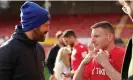  ?? Ashton/AMA/Getty Images ?? Paul Mullin (right) says the Wrexham coowners, Ryan Reynolds (left) and Rob McElhenney, are always ‘there in spirit’ if they cannot attend matches. Photograph: Matthew