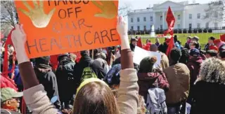  ?? - Reuters file photo ?? PROTEST: Protesters demonstrat­e against U.S. President Donald Trump and his plans to end Obamacare outside the White House in Washington, US.