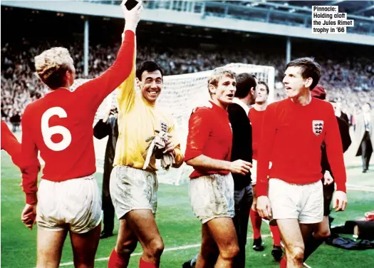  ??  ?? Pinnacle: Holding aloft the Jules Rimet trophy in ’66