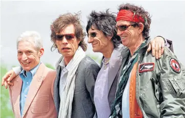  ??  ?? From left: Charlie Watts, Mick Jagger, Ronnie Wood and Keith Richards in 2002.