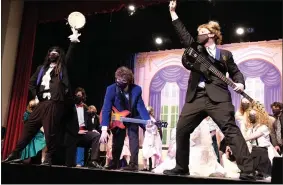  ?? SUBMITTED PHOTO - KIMBERLY MAUGER ?? Students perform “The Wedding Singer” at East High School in West Chester on Thursday night.