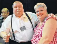  ?? JEREMY FRASER/CAPE BRETON POST ?? Carroll Morgan, left, and his wife Marlene Morgan poise for a photo during the annual Cape Breton Sports Hall of Fame at Centre 200 in Sydney on June 1. The Whiteside, Richmond County, boxer who represente­d Canada at the 1972 Olympic died Wednesday at...