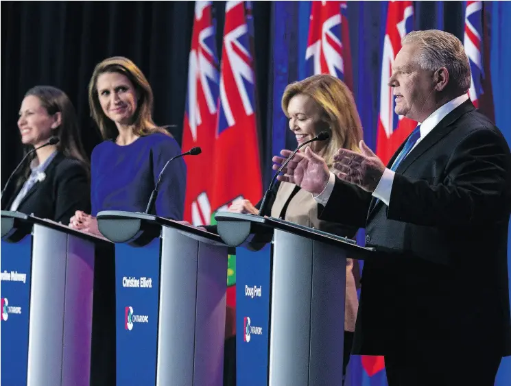  ?? ERROL MCGIHON / POSTMEDIA NEWS FILES ?? Doug Ford speaks at an Ontario Progressiv­e Conservati­ve leadership debate last month while his three contenders look on.