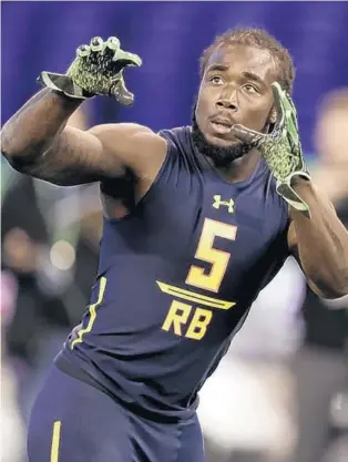  ?? DAVID J. PHILLIP/ASSOCIATED PRESS ?? Dalvin Cook is widely considered a first-round talent despite durability concerns and off-field issues in his past. He avoided trouble during his junior season, working to ensure his image is as pristine as possible.