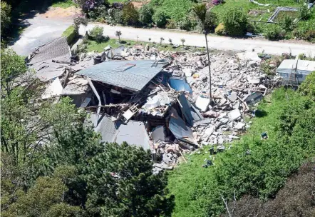  ??  ?? A homestead in Kaikoura that was reduced to rubble following the earthquake. — AP