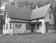  ?? BENJAMIN KAIL/THE DAY ?? The historical Nevins Tenant Cottage on Rope Ferry Road in Waterford, seen Tuesday, has been vacant for about a half-dozen years. Town officials and historical preservati­onists plan to review options for reuse and costs to stabilize the deteriorat­ed structure in the coming weeks.