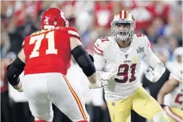  ?? STEVE LUCIANO/AP ?? Defensive end Arik Armstead (91) of the 49ers could draw interest from the Dolphins when free agency starts next week if Armstead becomes an unrestrict­ed free agent.