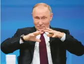  ?? ALEXANDER ZEMLIANICH­ENKO/POOL ?? Russian President Vladimir Putin gestures Thursday during his annual end-of-year news conference in Moscow, which lasted over four hours.