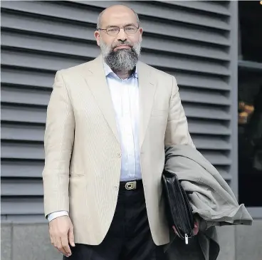  ?? COLIN PERKEL / THE CANADIAN PRESS ?? Mohamed Mahjoub, 56, outside the Federal Court of Appeal in Toronto on Wednesday. Strict release conditions need to continue for Mahjoub, a judge ruled.