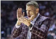  ?? (AP/Vasha Hunt) ?? Led by Coach Nate Oats (above), Alabama is No. 1 in the final regular-season Associated Press Top 25 men’s basketball poll this season. Houston, Purdue, Kansas and Texas round out the top five.