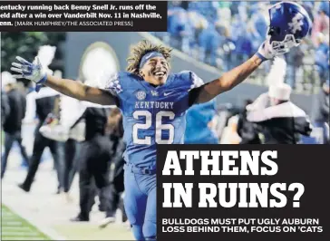  ??  ?? Kentucky running back Benny Snell Jr. runs off the field after a win over Vanderbilt Nov. 11 in Nashville, Tenn. [MARK HUMPHREY/THE ASSOCIATED PRESS]