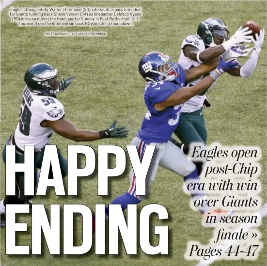  ?? PETER MORGAN — THE ASSOCIATED PRESS ?? Eagles strong safety Walter Thurmond (26) intercepts a pass intended for Giants running back Shane Vereen (34) as linebacker DeMeco Ryans (59) looks on during the third quarter Sunday in East Rutherford, N.J.
Thurmond ran the intercepti­on back 85yards...