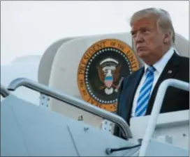  ?? CAROLYN KASTER — THE ASSOCIATED PRESS ?? President Donald Trump arrives on Air Force One, Monday in Andrews Air Force Base, Md.