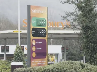  ?? ?? RISING: Prices at the pumps at Sainsbury’s in Halifax on February 20.