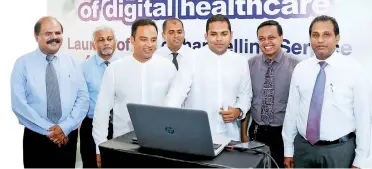  ??  ?? Official launch of echannelli­ng for government hospitals at ehospital Dompe by Telecommun­ication, Digital Infrastruc­ture and Foreign Employment Minister Harin Fernando. Also present (From left): Sri Lanka Telecom and Mobitel Chairman P.G. Kumarasing­he...