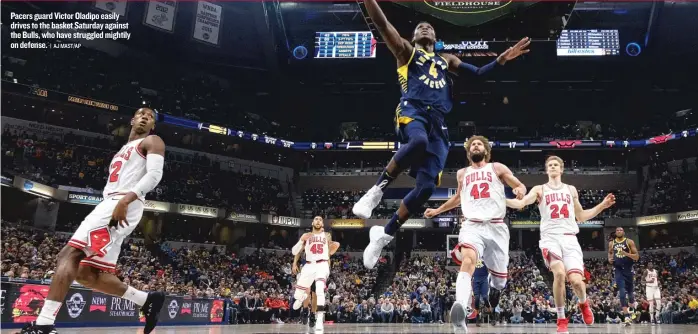  ?? | AJMAST/ AP ?? Pacers guard Victor Oladipo easily drives to the basket Saturday against the Bulls, who have struggled mightily on defense.
