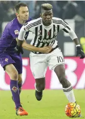  ?? GETTY IMAGES ?? Paul Pogba, 22 anni, supera Milan Badelj (26)