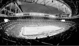  ?? JACK THOMAS/GETTY ?? Fans watch while the Texans and Jaguars face off in London’s Wembley Stadium on Nov. 3.