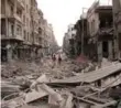  ?? SANA/THE ASSOCIATED PRESS ?? Aleppo’s government district after suicide bombings Wednesday.