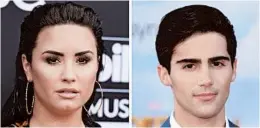  ?? AP PHOTOS 2018, LEFT, 2017 ?? Demi Lovato and Max Ehrich announced their engagement on Instagram in July.