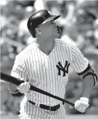  ?? Associated Press ?? ■ New York Yankees' Giancarlo Stanton watches his solo home run off Toronto Blue Jays starting pitcher Sean Reid-Foley during the fourth inning of a baseball game Saturday in New York.