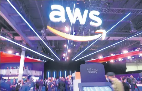  ??  ?? Amazon Web Services set up its booth at the Cloud Computing Conference and Expo organised at AWS re:Invent 2018 in Las Vegas. More than 1,000 IT and cloud computing firms and startups joined the event.