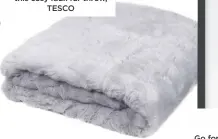  ??  ?? £32 Pile on the comfort with this cosy faux fur throw, TESCO