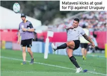  ??  ?? Matavesi kicks at goal for Fiji against Uruguay